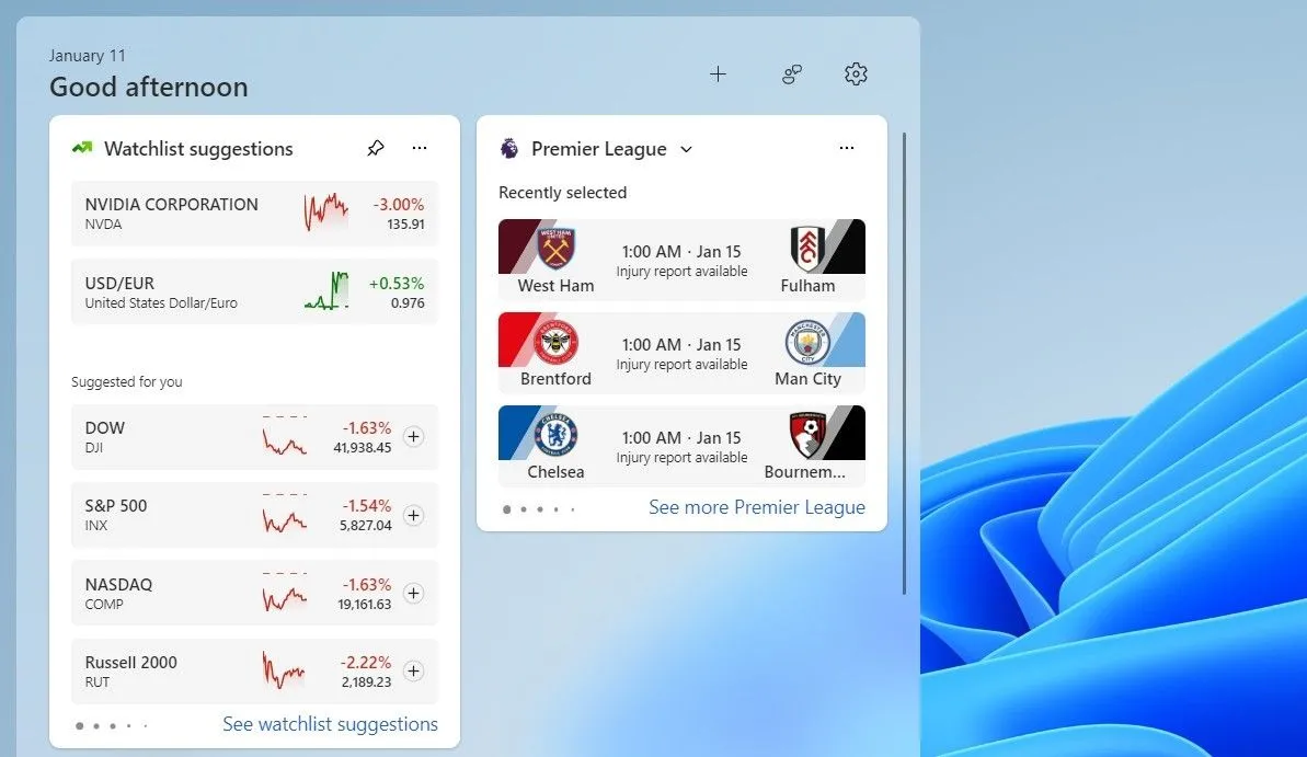 Bảng widget Windows 11 với tiện ích Danh mục theo dõi hiển thị giá cổ phiếu và tiền điện tử