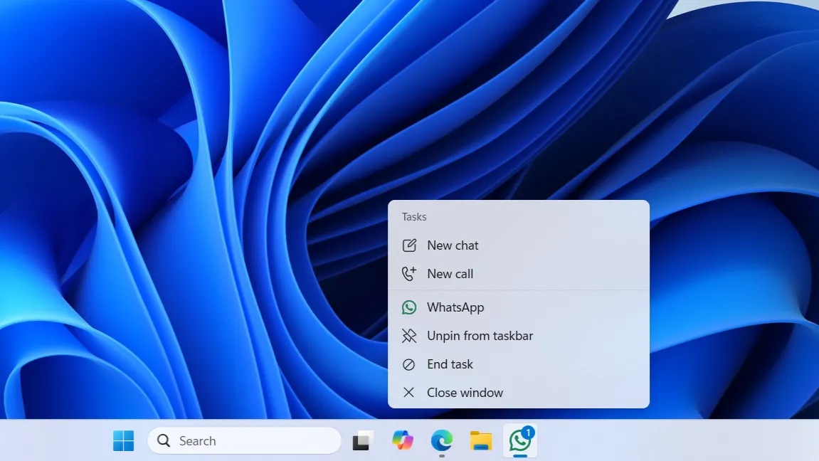 Buộc đóng ứng dụng bị treo trên Windows 11 bằng tùy chọn "End task" trên thanh Taskbar, ví dụ với WhatsApp.