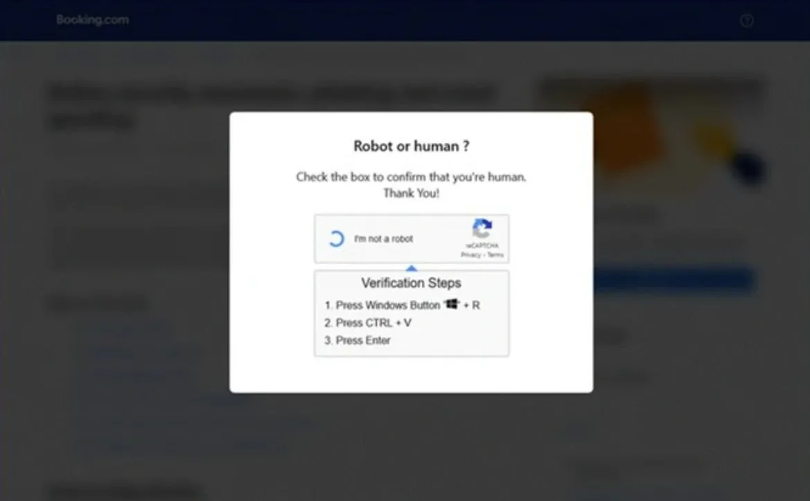 Giao diện CAPTCHA giả mạo yêu cầu chạy lệnh trong chiến dịch lừa đảo Booking.com