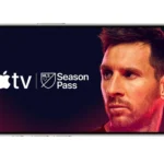 Hình ảnh logo Apple TV và MLS Season Pass hiển thị trên iPhone, minh họa cho ưu đãi xem bóng đá miễn phí từ T-Mobile.