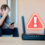 Hình ảnh một router Wi-Fi với biểu tượng cảnh báo, phía sau là người dùng đang lo lắng, minh họa nguy cơ bảo mật từ router cũ.