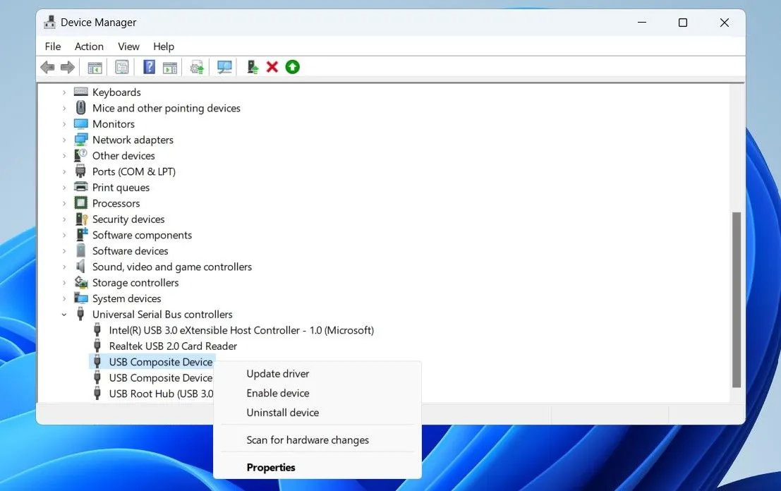 Kích hoạt lại driver USB thông qua Device Manager trên Windows