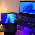 Laptop chạy hệ điều hành Windows 11 và macOS minh họa tốc độ khởi động nhanh của máy tính hiện đại.