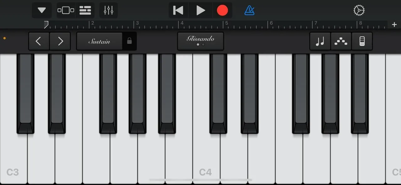 Màn hình ứng dụng GarageBand trên iPhone, hiển thị giao diện piano ảo với các phím đàn và tùy chọn điều khiển.