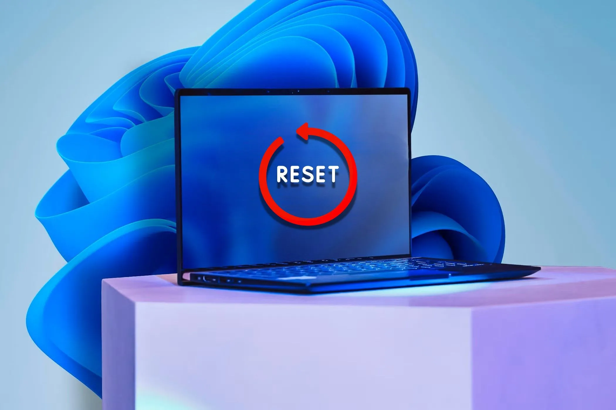 Một chiếc laptop với nhãn dán 'Reset' trên màn hình, tượng trưng cho giải pháp định dạng lại thiết bị cuối cùng để loại bỏ triệt để malware dai dẳng.
