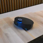Robot hút bụi Dreame X50 đang trình diễn khả năng vượt ngưỡng cửa nhờ công nghệ ProLeap System tại CES 2025